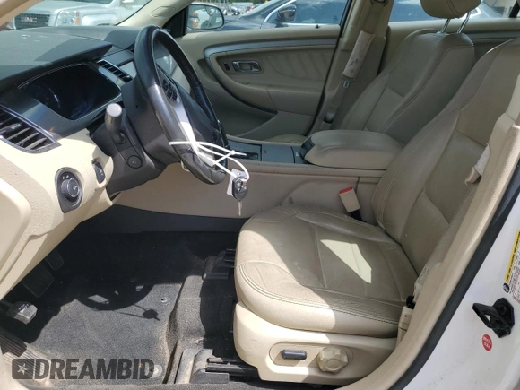 2014 Ford Taurus SEL with VIN 1FAHP2E82EG139480, listed as a Copart auction lot 52765215 with 114,600 mi miles and Salvage Title. Bid and sale history available at carsss.com. Image 7.