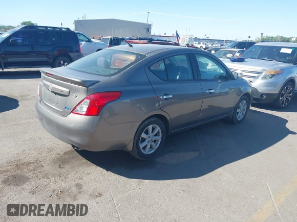 2013 Nissan Versa S with VIN 3N1CN7AP8DL820857, listed as a IAAI auction lot 42690300 with 154,408 mi miles and . Bid and sale history available at DreamBid. Image 4.