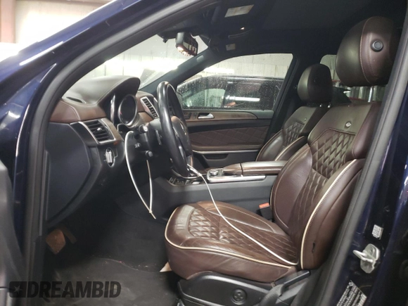 2014 Mercedes-Benz GL 450 z VIN 4JGDF7CE9EA345301, wystawiony jako Copart lot #49129005 z przebiegiem 120 981 mil mil oraz Szkoda całkowita • Salvage title. Historia ofert i sprzedaży dostępna na DreamBid. Obrazek 7.