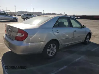 2003 Toyota Camry LE with VIN JTDBE32K930176303, listed as a Copart auction lot 52633565 with 168,231 mi miles and Salvage Title. Bid and sale history available at DreamBid. Image 3.