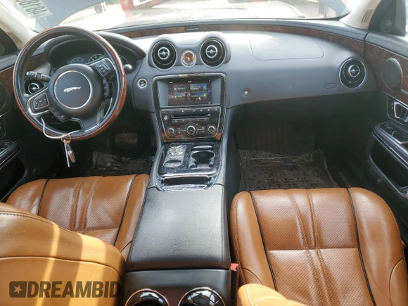 2016 Jaguar XJ R-Sport с VIN SAJWJ1CDXG8W03448, выставлен на аукционе Copart как лот 48188865 с пробегом 65 356 миль миль и Списание • Salvage title. История ставок и продаж доступна на DreamBid. Изображение 8.