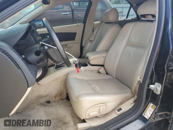 2005 Cadillac CTS with VIN 1G6DP567850124557, listed as a Copart auction lot 76398794 with 112,785 mi miles and Salvage Title. Bid and sale history available at carsss.com. Image 7.