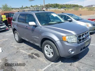 2008 Ford Escape Hybrid z VIN 1FMCU49H78KB05373, wystawiony jako IAAI lot #42674809 z przebiegiem 111 299 mil mil oraz . Historia ofert i sprzedaży dostępna na DreamBid. Obrazek 1.