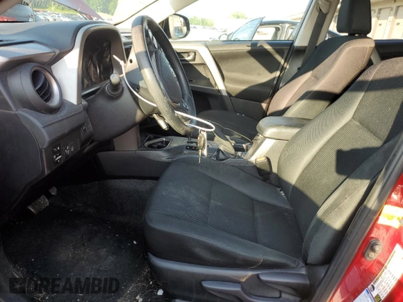 2018 Toyota RAV4 LE with VIN 2T3BFREV7JW723938, listed as a Copart auction lot 62814195 with 107,051 mi miles and Salvage title. Bid and sale history available at DreamBid. Image 7.