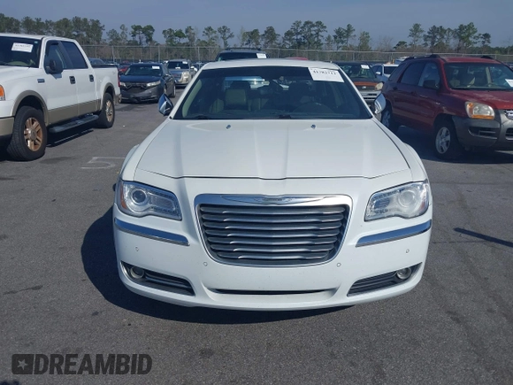 2013 Chrysler 300 Luxury Series with VIN 2C3CCASGXDH573689, listed as a IAAI auction lot 41782712 with 204,746 mi miles and . Bid and sale history available at DreamBid. Image 13.