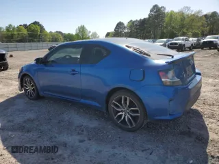 2016 Scion tC z VIN JTKJF5C75GJ022534, wystawiony jako Copart lot #52254005 z przebiegiem 103 812 mil mil oraz Szkoda całkowita • Salvage title. Historia ofert i sprzedaży dostępna na DreamBid. Obrazek 2.