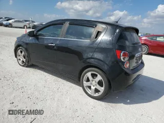2012 Chevrolet Sonic LTZ z VIN 1G1JE6SH9C4130554, wystawiony jako Copart lot #45020925 z przebiegiem 152 038 mil mil oraz Czysty tytuł • Clean title. Historia ofert i sprzedaży dostępna na DreamBid. Obrazek 2.