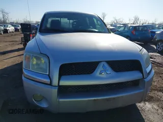 2006 Mitsubishi Raider LS with VIN 1Z7HT28K86S580062, listed as a IAAI auction lot 41766477 with 255,704 mi miles. Bid and sale history available at carsss.com. Image 6.