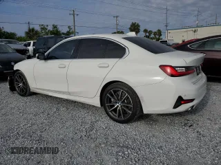 2020 BMW 3 Series 330i with VIN WBA5R1C0XLFH39262, listed as a Copart auction lot 57398585 with 55,456 mi miles and Salvage title. Bid and sale history available at DreamBid. Image 2.