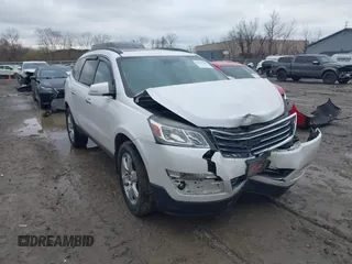 2016 Chevrolet Traverse LTZ z VIN 1GNKRJKD5GJ123261, wystawiony jako IAAI lot #42016385 z przebiegiem 107 758 mil mil oraz . Historia ofert i sprzedaży dostępna na DreamBid. Obrazek 1.