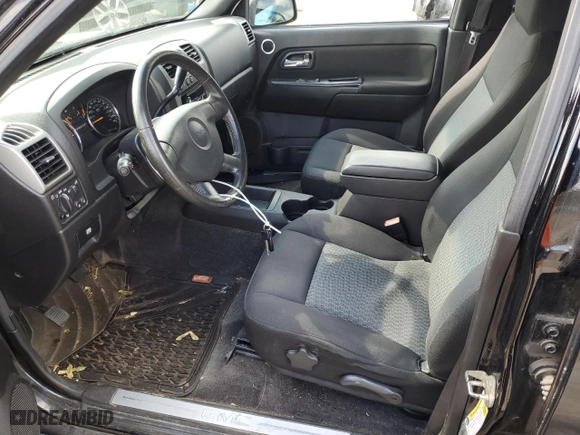 2011 GMC Canyon SLE1 with VIN 1GTH6MFE8B8102114, listed as a Copart auction lot 74137234 with 150,598 mi miles and Salvage Title. Bid and sale history available at carsss.com. Image 7.