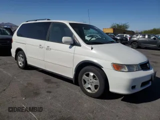 2000 Honda Odyssey EX with VIN 2HKRL1866YH625370, listed as a Copart auction lot 60981315 with 123,795 mi miles and Clean title. Bid and sale history available at DreamBid. Image 4.
