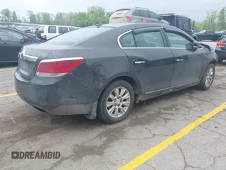2013 Buick LaCrosse with VIN 1G4GA5E38DF175462, listed as a IAAI auction lot 42248430 with 129,026 mi miles and . Bid and sale history available at DreamBid. Image 4.