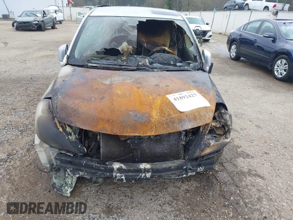 2011 Nissan Versa S with VIN 3N1BC1AP9BL381390, listed as a IAAI auction lot 41892427 with Not provided miles and . Bid and sale history available at DreamBid. Image 6.