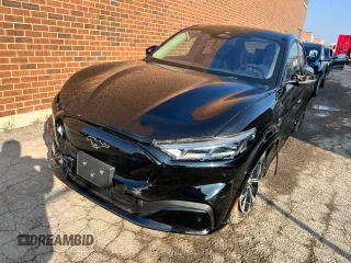 2021 Ford Mustang Mach-E Premium z VIN 3FMTK3SU0MMA43521, wystawiony jako Copart lot #69157472 z przebiegiem 1 659 mil mil oraz . Historia ofert i sprzedaży dostępna na DreamBid. Obrazek 10.