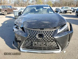 2023 Lexus UX 250h Premium с VIN JTHP9JBH8P2069805, выставлен на аукционе Copart как лот 87671095 с пробегом 12 599 миль миль и Списание • Salvage title. История ставок и продаж доступна на DreamBid. Изображение 5.