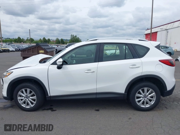 2016 Mazda CX-5 Sport with VIN JM3KE4BY7G0764563, listed as a IAAI auction lot 42279993 with 128,950 mi miles and . Bid and sale history available at DreamBid. Image 14.