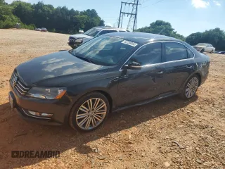 2014 Volkswagen Passat SE with VIN 1VWBS7A39EC115719, listed as a Copart auction lot 63750855 with 131,852 mi miles and Salvage title. Bid and sale history available at DreamBid. Image 1.