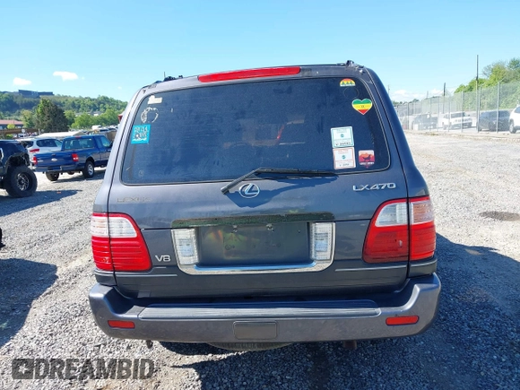 2003 Lexus LX with VIN JTJHT00W233532297, listed as a IAAI auction lot 42189676 with 235,992 mi miles. Bid and sale history available at carsss.com. Image 16.