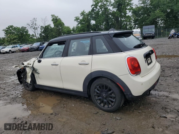 2017 MINI Hardtop 4 Door Cooper with VIN WMWXU1C53H2E18584, listed as a Copart auction lot 61355915 with 56,171 mi miles and Salvage title. Bid and sale history available at DreamBid. Image 2.