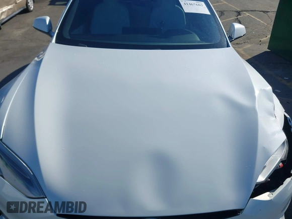 2021 Tesla Model S Long Range with VIN 5YJSA1E56MF453711, listed as a IAAI auction lot 41467603 with 115,634 mi miles and . Bid and sale history available at DreamBid. Image 10.