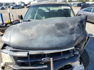 1998 Ford F-150 с VIN 1FTZX18W4WKA79557, выставлен на аукционе Copart как лот 48406375 с пробегом 192 577 миль миль и Списание • Salvage title. История ставок и продаж доступна на DreamBid. Изображение 12.