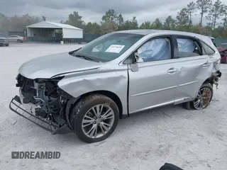 2013 Lexus RX 450h with VIN JTJZB1BA8D2008237, listed as a IAAI auction lot 41574651 with 106,732 mi miles and . Bid and sale history available at DreamBid. Image 2.