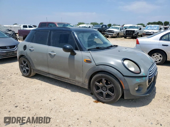 2015 MINI Hardtop 4 Door с VIN WMWXS5C51FT830794, выставлен на аукционе Copart как лот 57451785 с пробегом 171 669 миль миль и Списание • Salvage title. История ставок и продаж доступна на DreamBid. Изображение 4.
