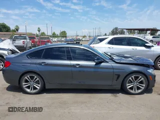 2015 BMW 4 Series 428i with VIN WBA4A5C59FG052596, listed as a IAAI auction lot 42649927 with 68,842 mi miles and . Bid and sale history available at DreamBid. Image 13.