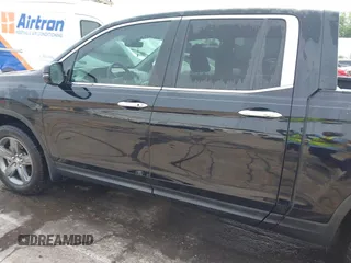 2023 Honda Ridgeline RTL-E with VIN 5FPYK3F76PB042100, listed as a IAAI auction lot 42274861 with 16,822 mi miles and . Bid and sale history available at DreamBid. Image 14.