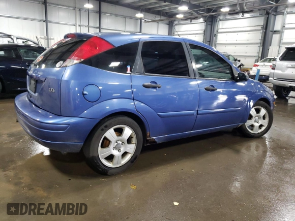 2004 Ford Focus ZX5 with VIN 3FAFP37354R102932, listed as a Copart auction lot 78814004 with 203,087 mi miles and Salvage title. Bid and sale history available at DreamBid. Image 3.
