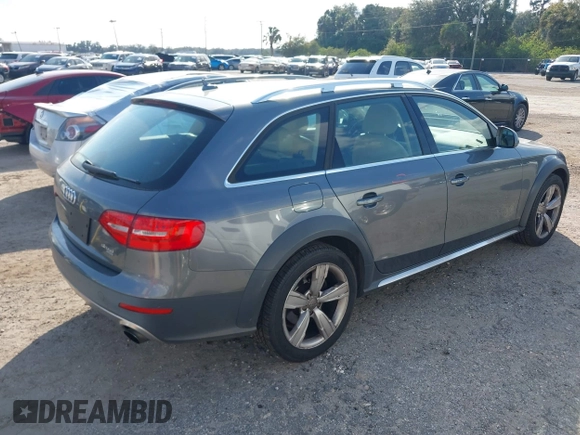 2014 Audi allroad A4 Premium Plus z VIN WA1UFAFL7EA006011, wystawiony jako IAAI lot #41494881 z przebiegiem 70 461 mil mil oraz . Historia ofert i sprzedaży dostępna na DreamBid. Obrazek 4.