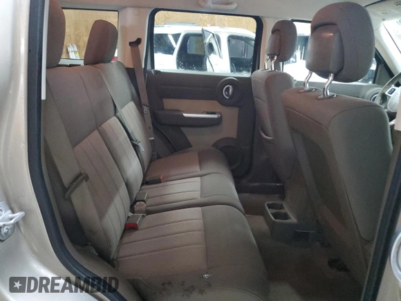 2010 Dodge Nitro SXT z VIN 1D4PU5GK8AW124381, wystawiony jako Copart lot #89302485 z przebiegiem 115 947 mil mil oraz Czysty tytuł • Clean title. Historia ofert i sprzedaży dostępna na DreamBid. Obrazek 11.