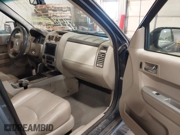 2008 Mercury Mariner Premier with VIN 4M2CU97168KJ20982, listed as a IAAI auction lot 41999498 with 151,524 mi miles and . Bid and sale history available at DreamBid. Image 5.