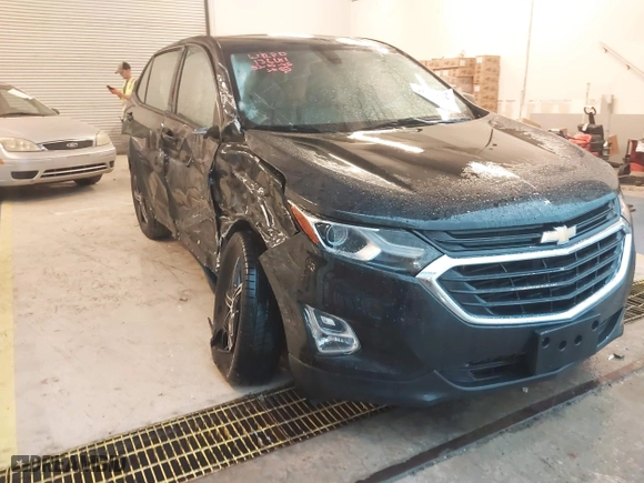 2019 Chevrolet Equinox LS with VIN 3GNAXHEV0KL147077, listed as a IAAI auction lot 41572529 with 56,817 mi miles. Bid and sale history available at carsss.com. Image 6.