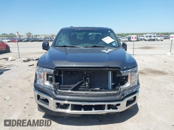 2018 Ford F-150 XL z VIN 1FTEW1CP5JKD12694, wystawiony jako IAAI lot #42002533 z przebiegiem 94 027 mil mil oraz . Historia ofert i sprzedaży dostępna na DreamBid. Obrazek 12.
