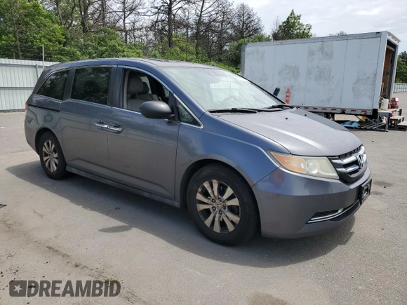 2014 Honda Odyssey EX-L with VIN 5FNRL5H68EB115720, listed as a Copart auction lot 62910725 with 132,254 mi miles and Clean title. Bid and sale history available at DreamBid. Image 4.