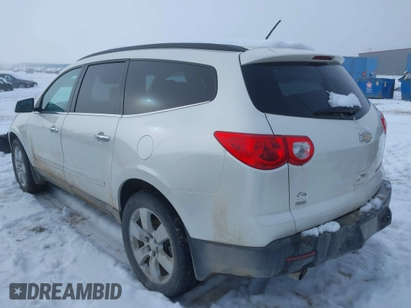 2012 Chevrolet Traverse LTZ z VIN 1GNKVLED6CJ289589, wystawiony jako IAAI lot #41226374 z przebiegiem 122 515 mil mil oraz . Historia ofert i sprzedaży dostępna na DreamBid. Obrazek 3.