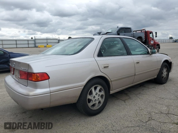 2000 Toyota Camry CE with VIN 4T1BG22K1YU621861, listed as a Copart auction lot 51611275 with 153,153 mi miles and Salvage Title. Bid and sale history available at carsss.com. Image 3.