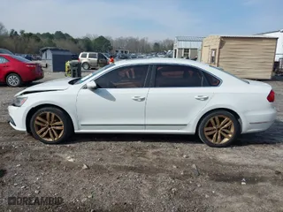 2016 Volkswagen Passat 1.8T SEL with VIN 1VWCT7A39GC057485, listed as a IAAI auction lot 41797043 with 82,632 mi miles. Bid and sale history available at carsss.com. Image 14.