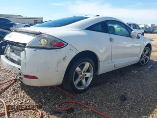 2008 Mitsubishi Eclipse GS z VIN 4A3AK24F28E007617, wystawiony jako IAAI lot #41877110 z przebiegiem 193 999 mil mil oraz . Historia ofert i sprzedaży dostępna na DreamBid. Obrazek 4.