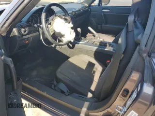 2006 Mazda MX-5 Miata Sport z VIN JM1NC25F260115830, wystawiony jako Copart lot #76844774 z przebiegiem 52 599 mil mil oraz Szkoda całkowita • Salvage title. Historia ofert i sprzedaży dostępna na DreamBid. Obrazek 8.