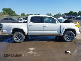 2017 Toyota Tacoma SR5 with VIN 5TFAZ5CNXHX044976, listed as a IAAI auction lot 42052922 with 149,116 mi miles and . Bid and sale history available at DreamBid. Image 13.