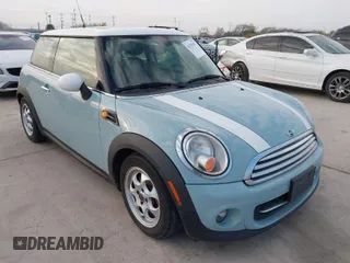 2013 MINI Cooper Hardtop with VIN WMWSU3C58DT683217, listed as a IAAI auction lot 41787402 with 148,803 mi miles. Bid and sale history available at carsss.com. Image 1.