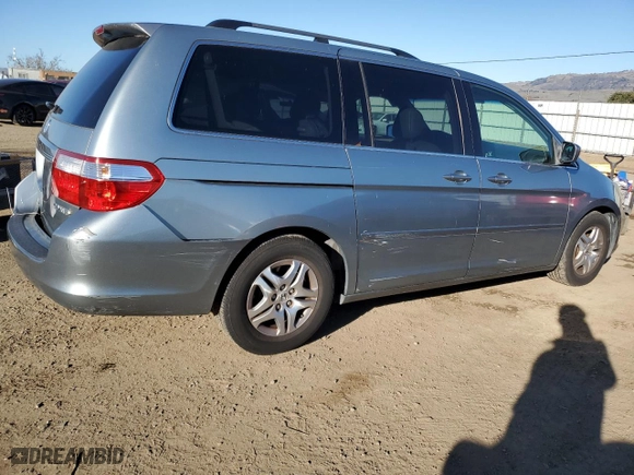 2005 Honda Odyssey EX-L with VIN 5FNRL38725B113023, listed as a Copart auction lot 88782965 with 217,682 mi miles and Salvage Title. Bid and sale history available at carsss.com. Image 3.