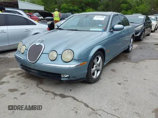 2003 Jaguar S-Type with VIN SAJEA01U33HM70079, listed as a IAAI auction lot 41939388 with 147,975 mi miles and . Bid and sale history available at DreamBid. Image 2.