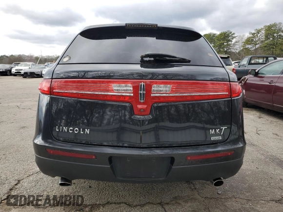 2015 Lincoln MKT with VIN 2LMHJ5NK9FBL01560, listed as a Copart auction lot 44083555 with 104,869 mi miles and Clean Title. Bid and sale history available at DreamBid. Image 6.