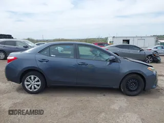 2015 Toyota Corolla L with VIN 2T1BURHE1FC381115, listed as a IAAI auction lot 42088980 with 203,493 mi miles and . Bid and sale history available at DreamBid. Image 12.