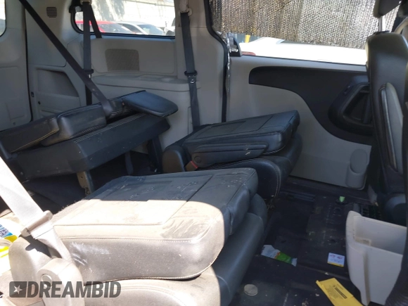 2018 Dodge Grand Caravan SXT with VIN 2C4RDGCG7JR203374, listed as a IAAI auction lot 41664694 with 113,332 mi miles and . Bid and sale history available at DreamBid. Image 8.