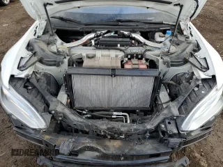 2017 Tesla Model S 100D с VIN 5YJSA1E26HF212985, выставлен на аукционе Copart как лот 46702705 с пробегом 58 179 миль миль и Списание • Salvage title. История ставок и продаж доступна на DreamBid. Изображение 11.